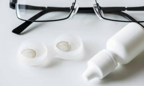 closeup-of-contact-lens-bottle-of-solution-and-an-P4NUXHF-1 closeup-of-contact-lens-bottle-of-solution-and-an-P4NUXHF-1
